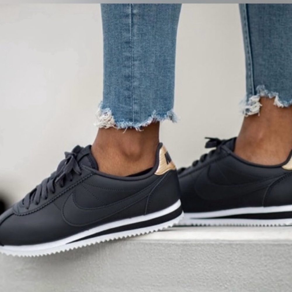 Rare Nike Cortez, black leather with gold accent women’s size 10
